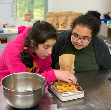 Bellcate School Dog Treats students weighing all natural dog treats