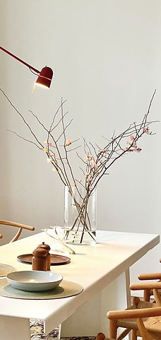 Still life of vase and flower branches