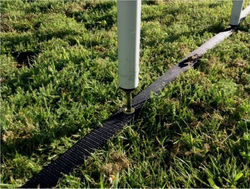 Stick poles to the ground with spacing ribbon
