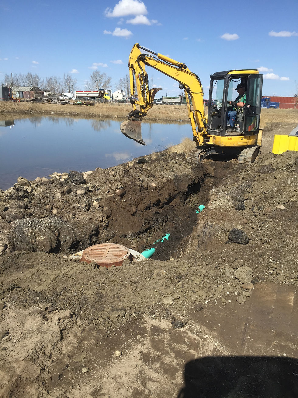 Catch basin and pipe install for parking lot drainage