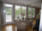 Family room with new windows, doors,