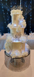 Glitz and glamour cake by Stentons Cakes with sparkling lights and glittery decorations, perfect for special.