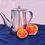 Thumbnail: Teapot and orange fruits - Framed