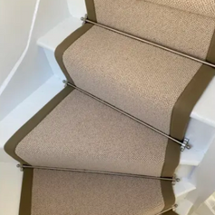 brown and white carpeted staircase