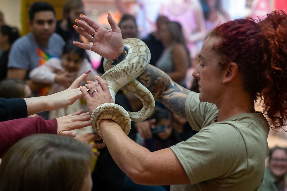 woman holding snake
