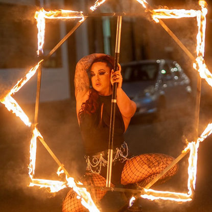 fire performer in leotard