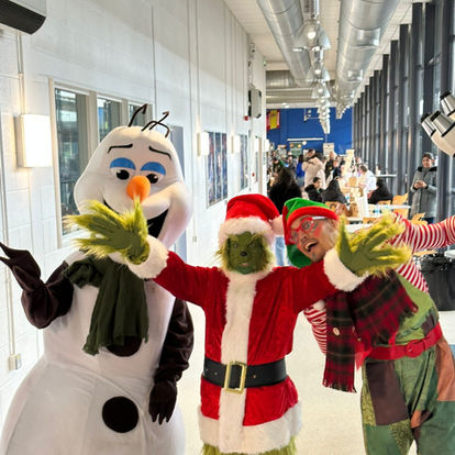 people in Christmas costumes