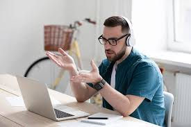 Male teacher delivering ESL lessons online