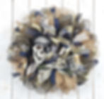 Handcrafted Gasparilla skull and flask pirate wreath designed for Tampa Bay homes