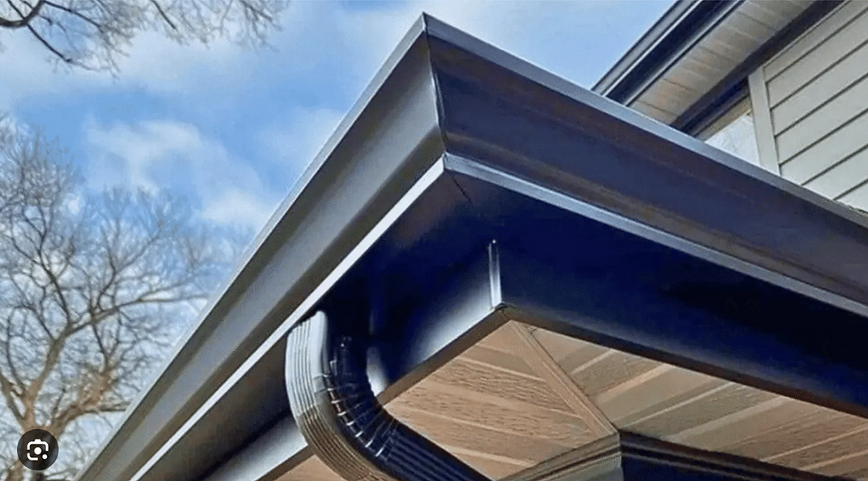 Black gutter system installed on residential property