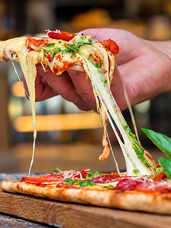 Gooey Pesto Pizza Cheese Pull.png