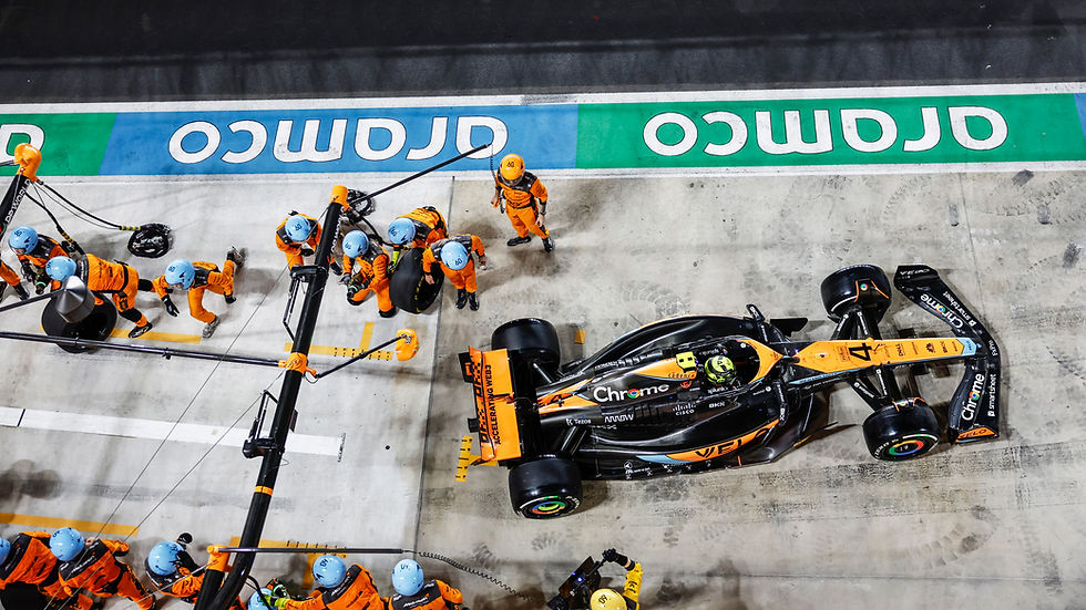 McLaren F1 team car leaving the pits