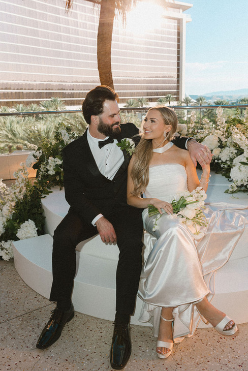 cute picture of the newlyweds smiling at each other