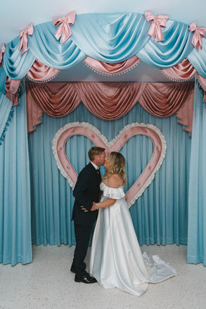 cute picture of the newlyweds kissing
