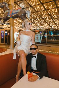 couple celebrating their elopement with drinks