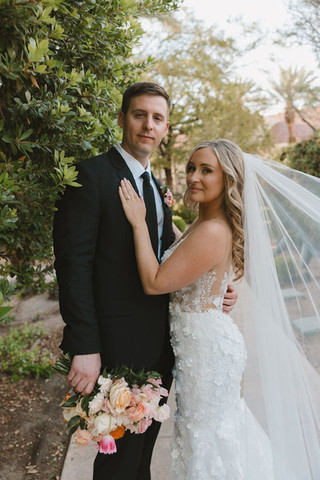 couple posing for the camera during their photoshoot