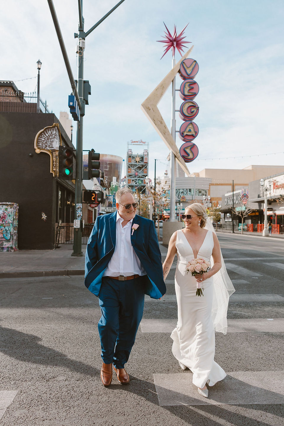 couple walking around DTLV before their ceremony