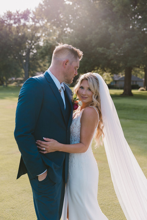 groom smiling at the bride