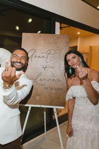 couple showing their wedding rings