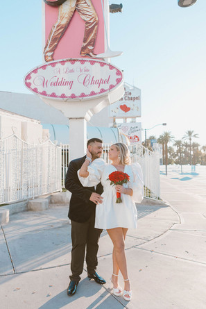 portrait of the bride and groom smiling at each other