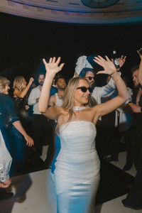 bride having the best time at her wedding reception