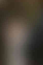 couple laughing with each other during their bridal portraits