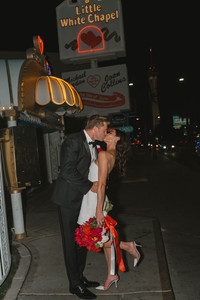 portrait of the newlyweds kissing