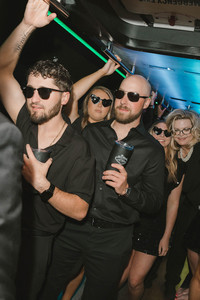 guests having the best time at the party bus