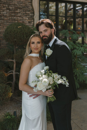 cute picture of the bride and groom hugging