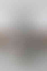 cute portrait of the bride and groom kissing after their ceremony