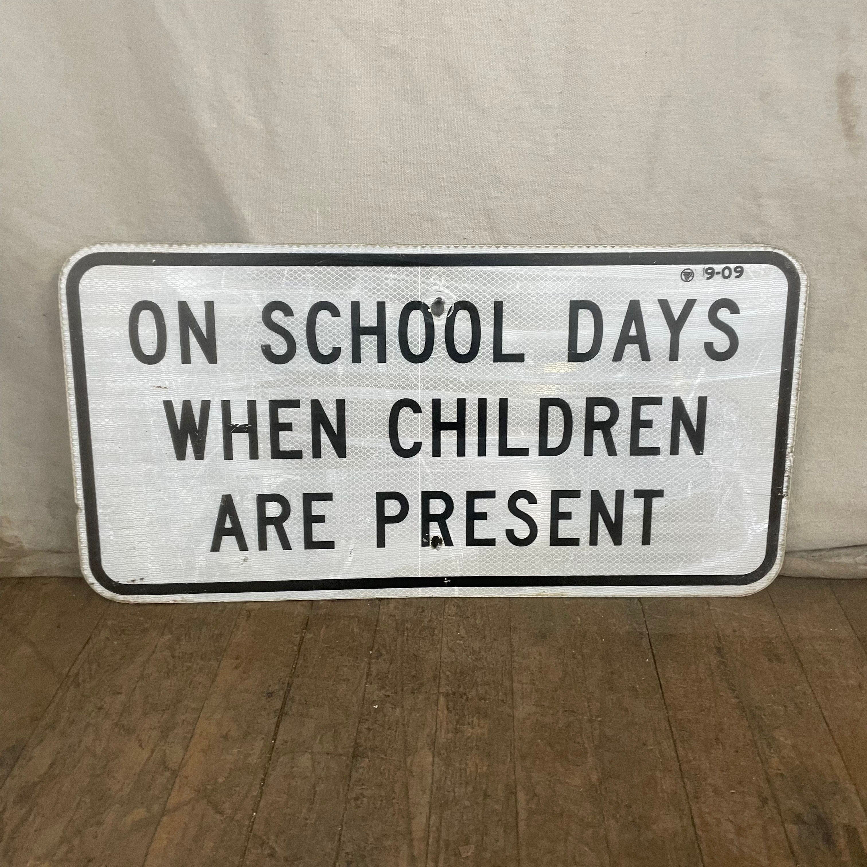 On School Days When Children Are Present Sign