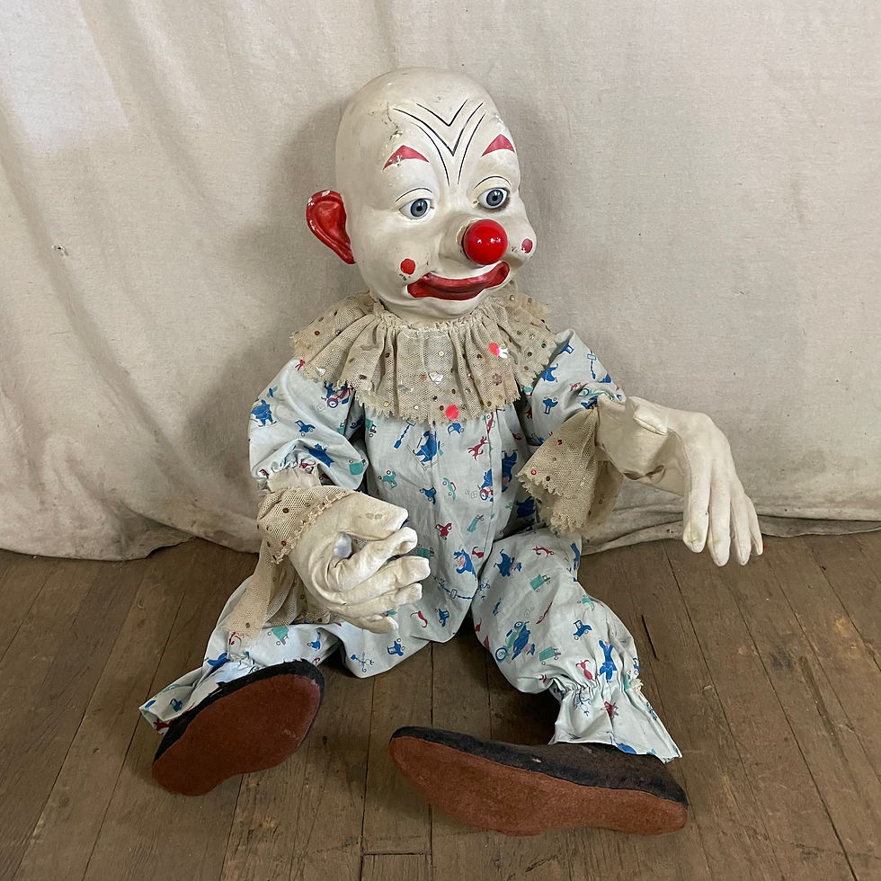Bald Sitting Clown