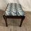 Thumbnail: Small Wood Foot Stool w/ Leaf Upholstery