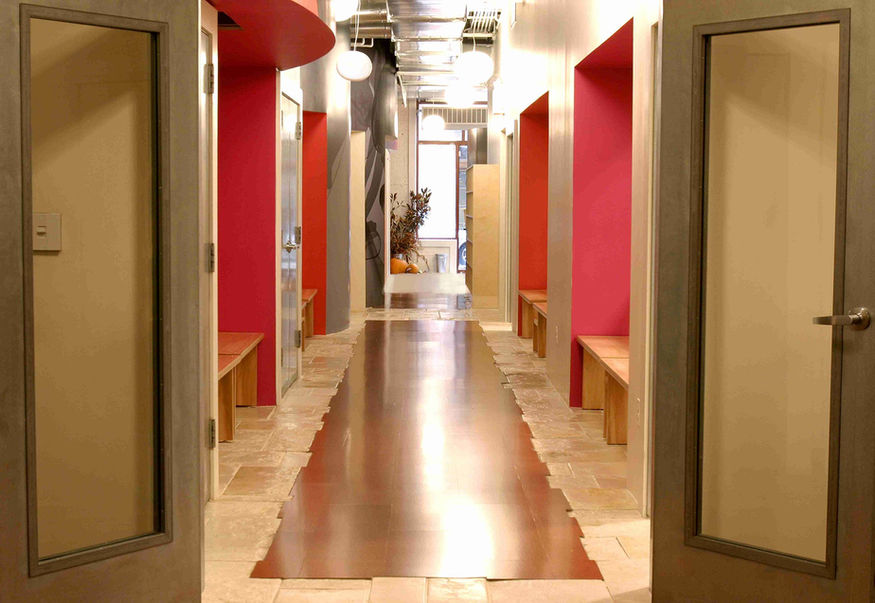 Yamuna Studio corridor with seating areas. Pamela Glazer Architecture