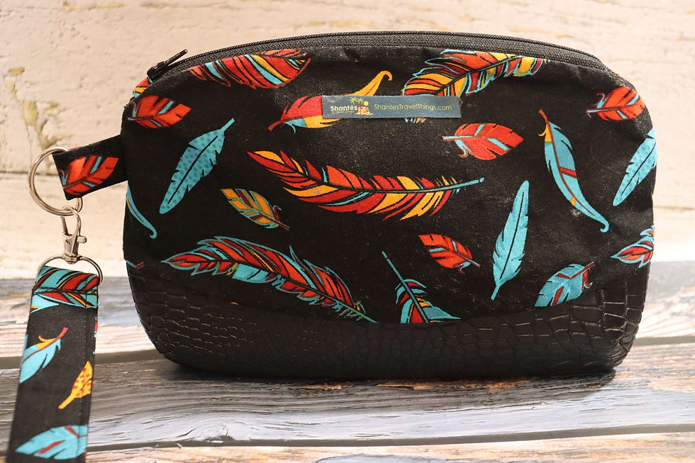 Thumbnail: The Vibrant Native Feather Wristlet