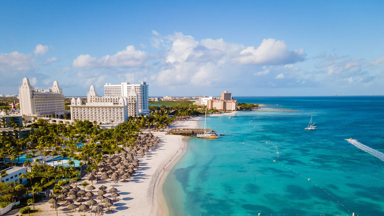 Turquoise Caribbean beach with luxury resort in Aruba