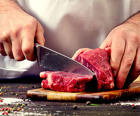 man cutting meat.jpg