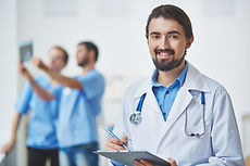 Male doctor with a clipboard
