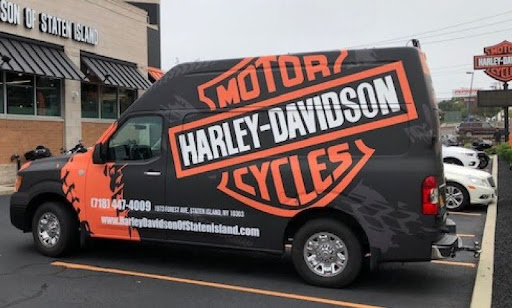 custom vehicle wrap and fleet graphics installed on branded Harley-Davidson service van