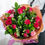 Thumbnail: Dark pink roses and spray carnations hand-tied bouquet