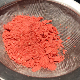 on a sifting stage red powder