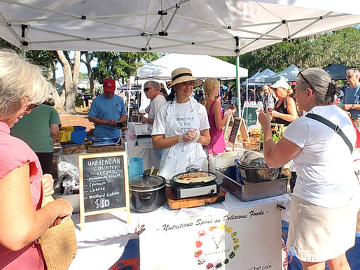 Innichka Chef at the Port Royal Farmers Market with fresh sourdough bread and Ukrainian pastries