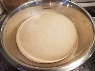 Dough resting in bowl while doubling in size