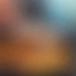 with thermometer checking if chicken is done