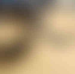 cutting dough with a circle cookie cutter