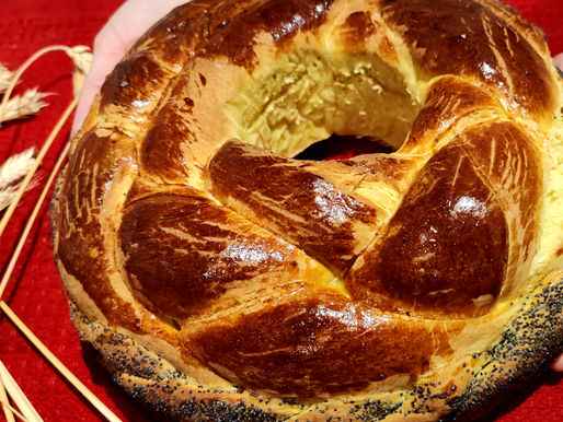 Ukrainian Kolach Christmas bread, braided ring with golden crust