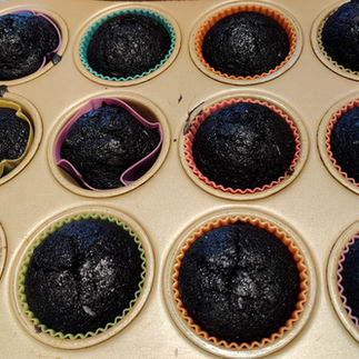 cupcakes black just came out of the oven