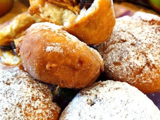 Discover Ponchiki, a beloved Ukrainian street food pastry filled with sweet apples. Light, fluffy, and dusted with sugar, these golden treats are a favorite comfort food perfect for autumn or any time you crave a cozy dessert.
