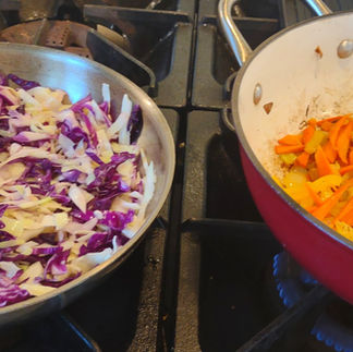 two pans with veggies