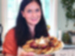 me holding platter with pancakes